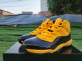 Air Jordan 11 Yellow and Black High-Top Sneakers