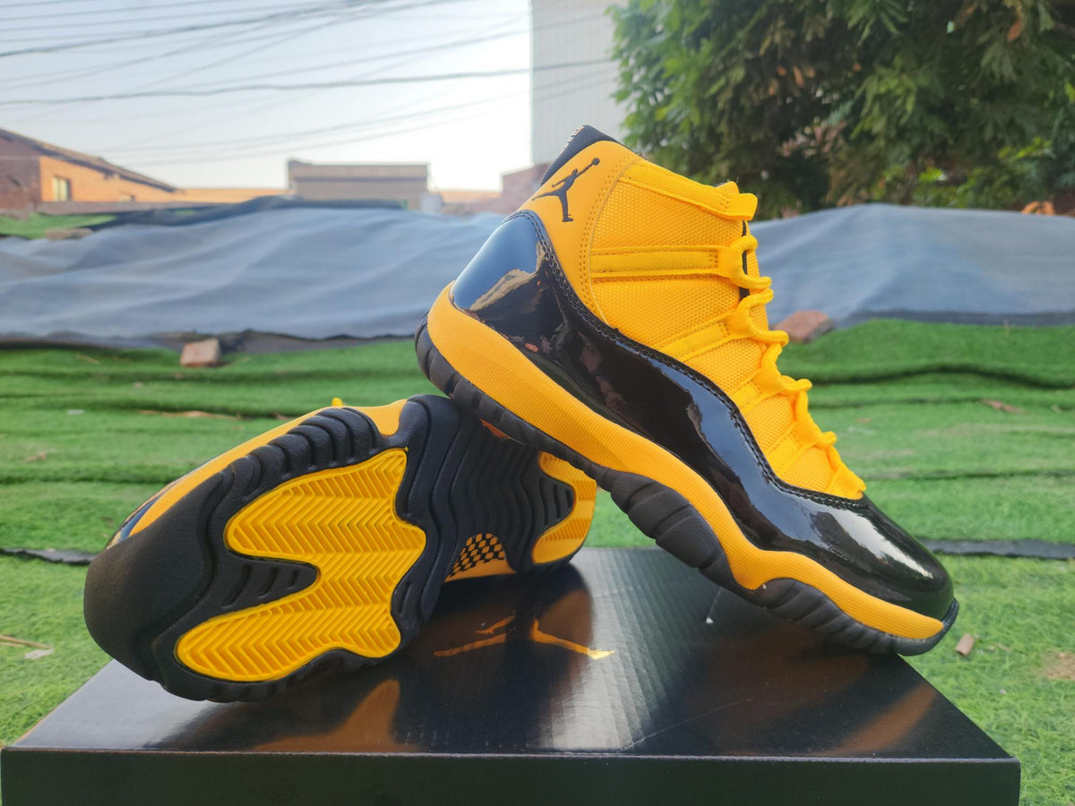 Air Jordan 11 Yellow and Black High-Top Sneakers