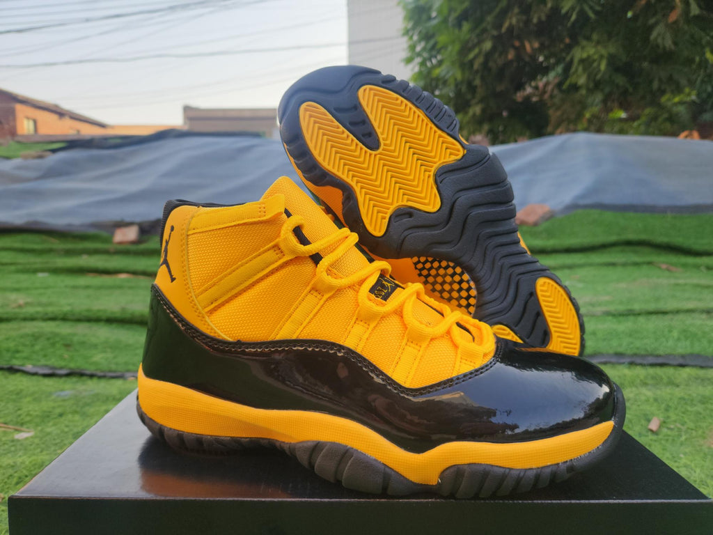 Air Jordan 11 Yellow and Black High-Top Sneakers