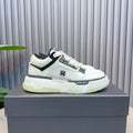 AMIRI Low-Top Sneakers – White / Black / Ivory