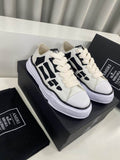 AMIRI Cream Low-Top Sneakers with Black Bone Appliqués