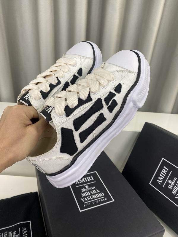 AMIRI Cream Low-Top Sneakers with Black Bone Appliqués