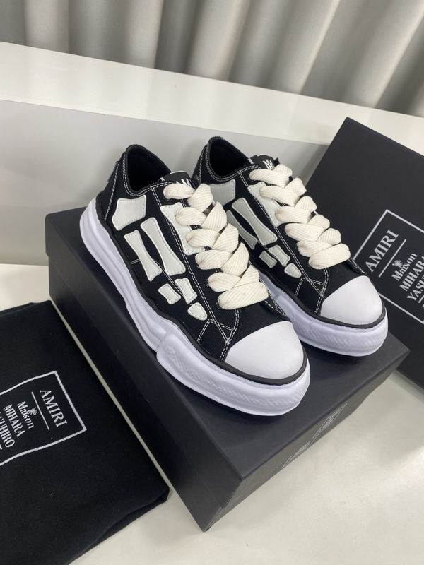 AMIRI Black Low-Top Sneakers with White Bone Appliqués