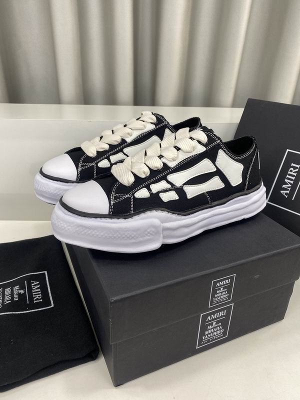 AMIRI Black Low-Top Sneakers with White Bone Appliqués