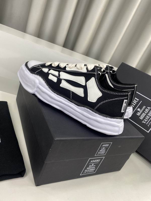 AMIRI Black Low-Top Sneakers with White Bone Appliqués