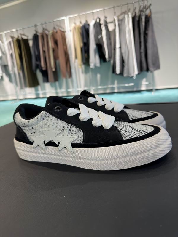 AMIRI Low-Top Sneakers – Black / White Snakeskin Print with Star Details