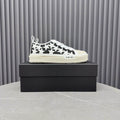 AMIRI White Star Low-Top Sneakers with Black Panels