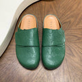 Green All-Over Embossed Slip-On Mules