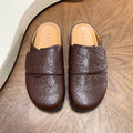 Brown All-Over Embossed Slip-On Mules