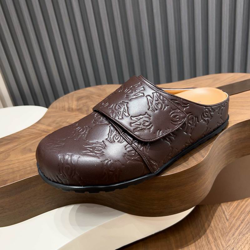 Brown All-Over Embossed Slip-On Mules